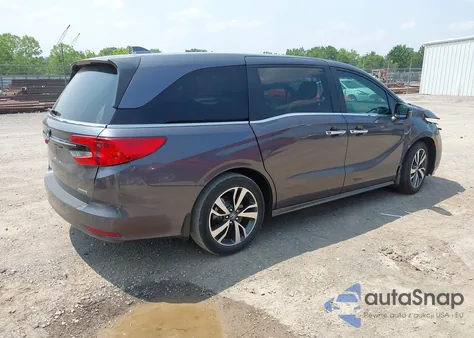 2022 Honda Odyssey Touring z USA, uszkodzony, nr VIN 5FNRL6H83NB023583